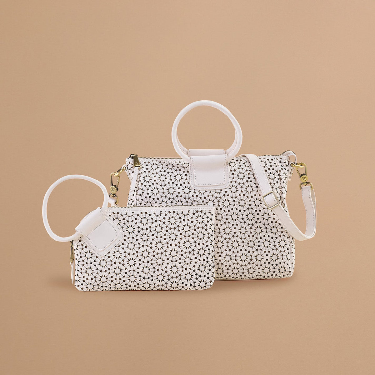 HOBO Top Pick - Sable Wristlet In Perforated Leather - Ecru Daisy Perf