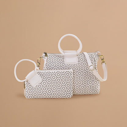 HOBO Top Pick - Sable Wristlet In Perforated Leather - Ecru Daisy Perf
